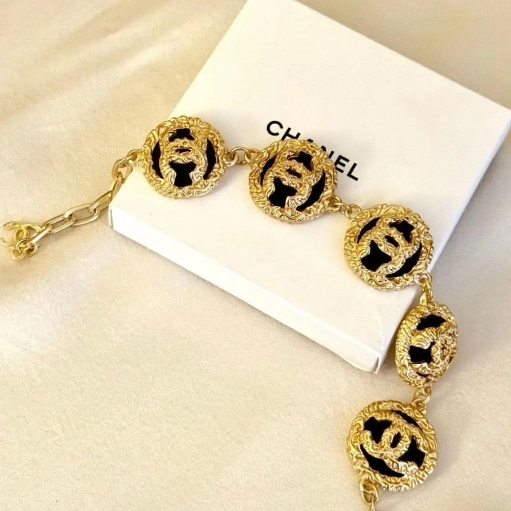 CHANEL Gold and Black Emblem Bracelet